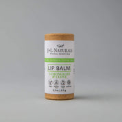 front close shot of lip balm in brown and green packaging in white backdrop 