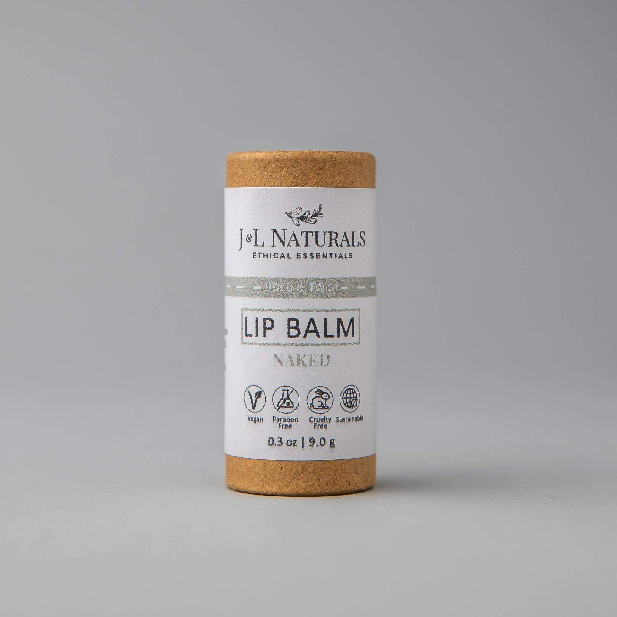 front close shot of lip balm in brown and grey packaging in white backdrop 