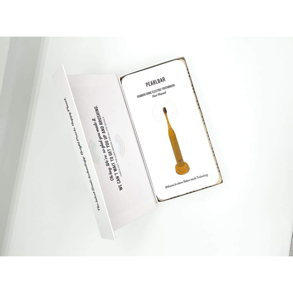 eco friendly bamboo electric toothbrush in a white box with text about the product